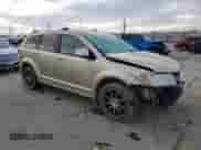 2011 Dodge Journey LUX with VIN 3D4PH9FG9BT522991, listed as a Copart auction lot 87270714 with 101,661 mi miles and Salvage title. Bid and sale history available at DreamBid. Image 4.