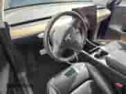 2020 Tesla Model Y Long Range z VIN 5YJYGDEF7LF014051, wystawiony jako Copart lot #81894885 z przebiegiem Nie podano mil oraz Szkoda całkowita • Salvage title. Historia ofert i sprzedaży dostępna na DreamBid. Obrazek 8.