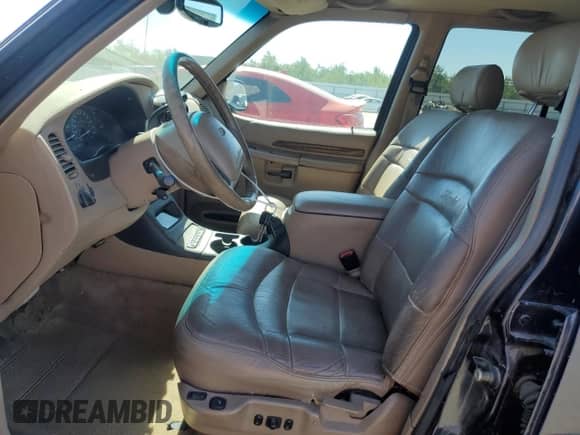 2000 Ford Explorer Limited with VIN 1FMDU75E0YZA21422, listed as a Copart auction lot 63618475 with 141,942 mi miles and Salvage title. Bid and sale history available at DreamBid. Image 7.