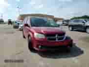 2014 Dodge Grand Caravan SXT 30th Anniversary with VIN 2C4RDGCGXER459093, listed as a Copart auction lot 80838535 with 128,561 mi miles and Salvage title. Bid and sale history available at DreamBid. Image 14.