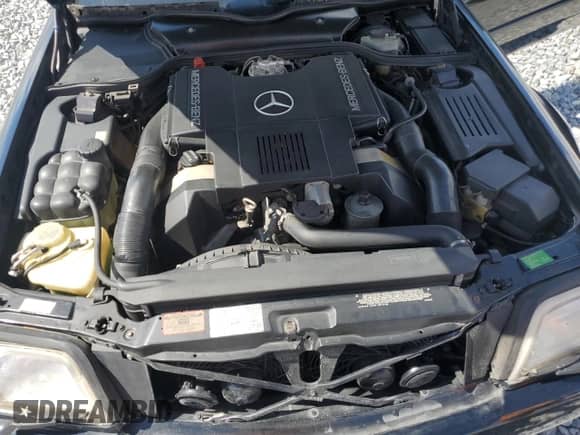 1992 Mercedes-Benz 500 z VIN WDBFA66E8NF059958, wystawiony jako Copart lot #89496365 z przebiegiem 145 053 mil mil oraz Czysty tytuł • Clean title. Historia ofert i sprzedaży dostępna na DreamBid. Obrazek 11.