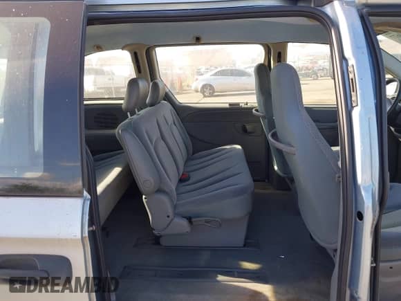2005 Dodge Caravan SE with VIN 1D4GP25B05B338870, listed as a IAAI auction lot 43173677 with 65,845 mi miles and . Bid and sale history available at DreamBid. Image 8.
