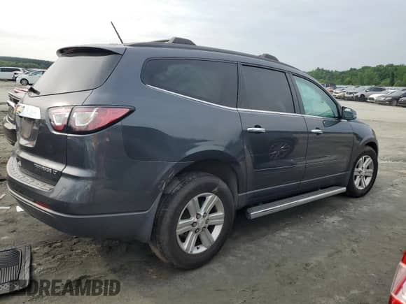2013 Chevrolet Traverse LT with VIN 1GNKRJKD0DJ177272, listed as a Copart auction lot 58762365 with 71,735 mi miles and Salvage title. Bid and sale history available at DreamBid. Image 3.