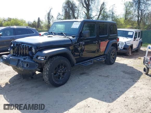 2022 Jeep Wrangler Unlimited Willys с VIN 1C4HJXDM8NW174277, выставлен на аукционе IAAI как лот 42076074 с пробегом 63 404 миль миль и . История ставок и продаж доступна на DreamBid. Изображение 17.