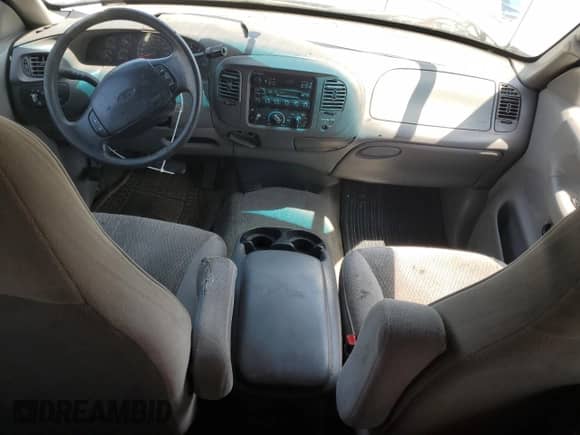 1998 Ford F-150 with VIN 1FTZX1763WKA58006, listed as a Copart auction lot 57264195 with 273,690 mi miles and Salvage title. Bid and sale history available at DreamBid. Image 8.