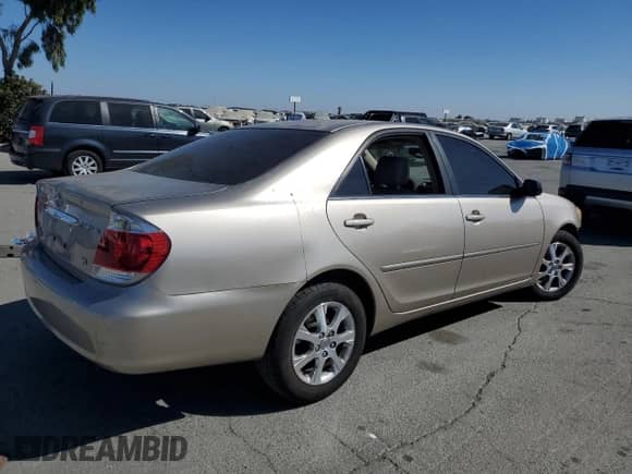 2005 Toyota Camry LE с VIN JTDBF32K750162836, выставлен на аукционе Copart как лот 81082105 с пробегом 131 582 миль миль и Списание • Salvage title. История ставок и продаж доступна на DreamBid. Изображение 3.