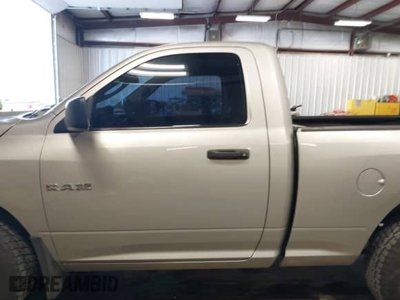 2010 Dodge 1500 ST with VIN 3D7JB1EK8AG170124, listed as a IAAI auction lot 41571732 with 116,987 mi miles and . Bid and sale history available at DreamBid. Image 14.