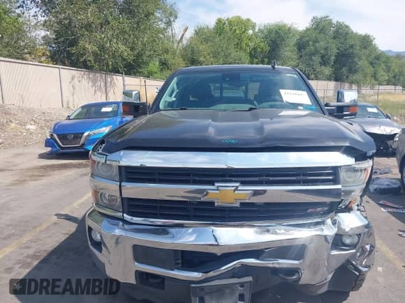 2015 Chevrolet Silverado 3500HD with VIN 1GC1K0EG5FF512945, listed as a IAAI auction lot 43138447 with 91,028 mi miles and . Bid and sale history available at DreamBid. Image 12.