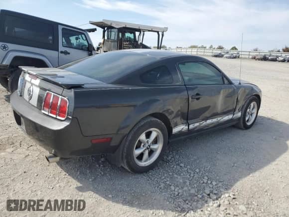 2008 Ford Mustang Deluxe with VIN 1ZVHT80N985157249, listed as a Copart auction lot 81014495 with 115,135 mi miles and Salvage title. Bid and sale history available at DreamBid. Image 3.