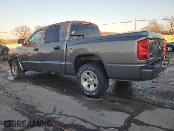 2009 Dodge Dakota with VIN 1D3HE38K09S818834, listed as a Copart auction lot 88713675 with 152,083 mi miles and Salvage title. Bid and sale history available at DreamBid. Image 2.