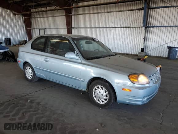 2005 Hyundai Accent GLS с VIN KMHCG35C85U321440, выставлен на аукционе Copart как лот 67861135 с пробегом 49 708 миль миль и Списание • Salvage title. История ставок и продаж доступна на DreamBid. Изображение 4.