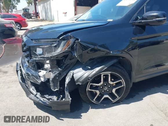 2023 Honda Passport Elite z VIN 5FNYF8H07PB015868, wystawiony jako IAAI lot #42673230 z przebiegiem 82 096 mil mil oraz . Historia ofert i sprzedaży dostępna na DreamBid. Obrazek 6.