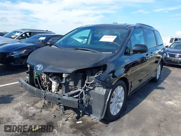 2011 Toyota Sienna XLE AAS with VIN 5TDYK3DC0BS037696, listed as a IAAI auction lot 42999220 with 357,399 mi miles and . Bid and sale history available at DreamBid. Image 18.