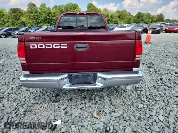 2001 Dodge Dakota с VIN 1B7GL22X51S147156, выставлен на аукционе Copart как лот 63417055 с пробегом Не указан миль и Списание • Salvage title. История ставок и продаж доступна на DreamBid. Изображение 6.