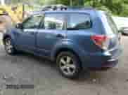 2011 Subaru Forester X z VIN JF2SHABC1BG711507, wystawiony jako Copart lot #64486475 z przebiegiem 173 037 mil mil oraz Szkoda całkowita • Salvage title. Historia ofert i sprzedaży dostępna na DreamBid. Obrazek 2.