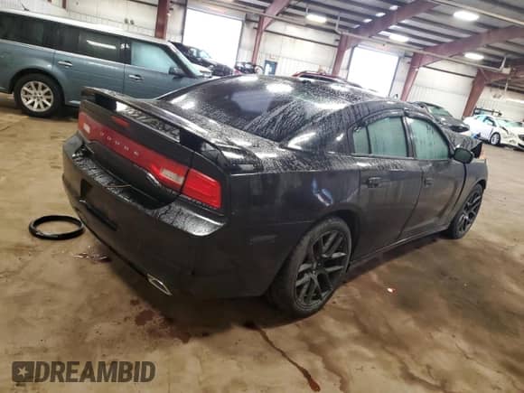 2013 Dodge Charger SXT с VIN 2C3CDXHG7DH705704, выставлен на аукционе Copart как лот 82070115 с пробегом 211 001 миль миль и Списание • Salvage title. История ставок и продаж доступна на DreamBid. Изображение 3.