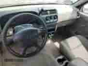 2001 Nissan Frontier XE with VIN 1N6DD26S21C397671, listed as a Copart auction lot 54108355 with 174,195 mi miles and Salvage title. Bid and sale history available at DreamBid. Image 8.