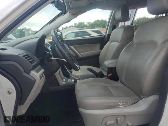 2014 Subaru Forester Limited z VIN JF2SJAHC5EH506704, wystawiony jako Copart lot #63712635 z przebiegiem 138 526 mil mil oraz Szkoda całkowita • Salvage title. Historia ofert i sprzedaży dostępna na DreamBid. Obrazek 7.