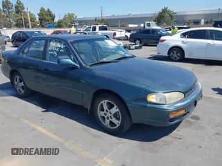 1996 Toyota Camry LE z VIN JT2BF12K3T0129827, wystawiony jako IAAI lot #42979065 z przebiegiem 291 967 mil mil oraz . Historia ofert i sprzedaży dostępna na DreamBid. Obrazek 1.