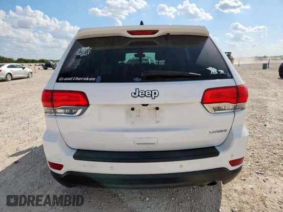 2017 Jeep Grand Cherokee Laredo with VIN 1C4RJEAG4HC638436, listed as a Copart auction lot 71111405 with 82,070 mi miles and Salvage title. Bid and sale history available at DreamBid. Image 6.