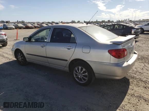 2004 Toyota Corolla CE with VIN JTDBR32E642017503, listed as a Copart auction lot 66919505 with 246,262 mi miles and Salvage title. Bid and sale history available at DreamBid. Image 2.