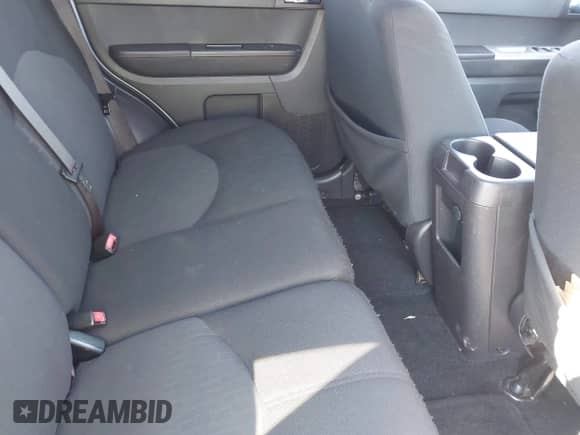 2008 Mercury Mariner with VIN 4M2CU91198KJ24730, listed as a IAAI auction lot 43341107 with 158,521 mi miles and . Bid and sale history available at DreamBid. Image 8.