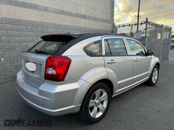 2010 Dodge Caliber SXT с VIN 1B3CB4HA1AD579409, выставлен на аукционе Copart как лот 91408935 с пробегом 100 311 миль миль и Чистый • Clean title. История ставок и продаж доступна на DreamBid. Изображение 4.