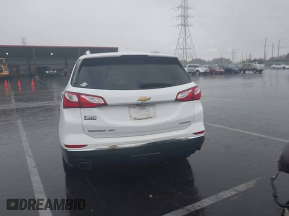 2020 Chevrolet Equinox Premier with VIN 3GNAXPEX4LS621292, listed as a IAAI auction lot 43267834 with 75,809 mi miles and . Bid and sale history available at DreamBid. Image 15.