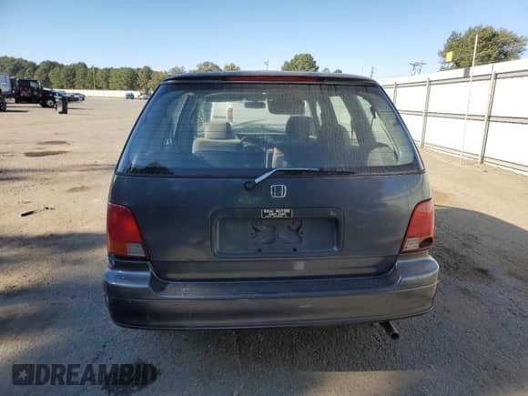 1996 Honda Odyssey EX with VIN JHMRA1872TC005312, listed as a Copart auction lot 76936024 with 153,652 mi miles and Salvage title. Bid and sale history available at DreamBid. Image 6.
