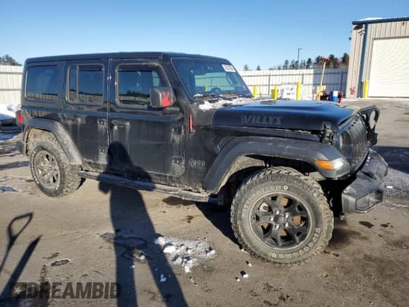 2023 Jeep Wrangler Willys with VIN 1C4HJXDG1PW527567, listed as a Copart auction lot 42218255 with 43,273 mi miles and Salvage title. Bid and sale history available at DreamBid. Image 4.