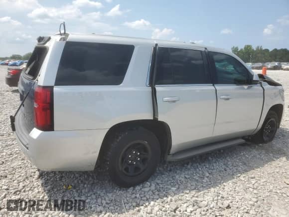 2015 Chevrolet Tahoe Commercial with VIN 1GNLC2EC4FR277653, listed as a Copart auction lot 69478765 with Not provided miles and Salvage title. Bid and sale history available at DreamBid. Image 3.