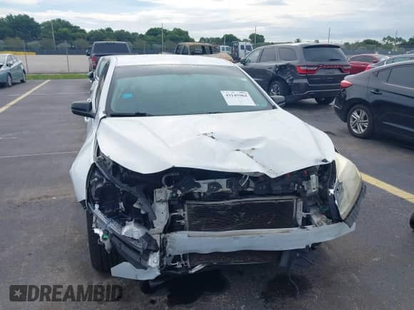 2015 Chevrolet Malibu LS z VIN 1G11A5SL1FU121779, wystawiony jako IAAI lot #43145984 z przebiegiem 149 524 mil mil oraz . Historia ofert i sprzedaży dostępna na DreamBid. Obrazek 6.