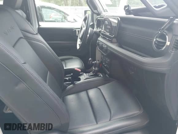 2024 Jeep Wrangler Sahara with VIN 1C4RJXP61RW193907, listed as a IAAI auction lot 42591776 with 11,874 mi miles and . Bid and sale history available at DreamBid. Image 5.