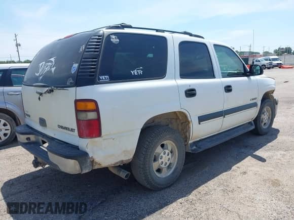 2002 Chevrolet Tahoe LT with VIN 1GNEK13Z92J275533, listed as a IAAI auction lot 42987780 with 236,329 mi miles and . Bid and sale history available at DreamBid. Image 4.