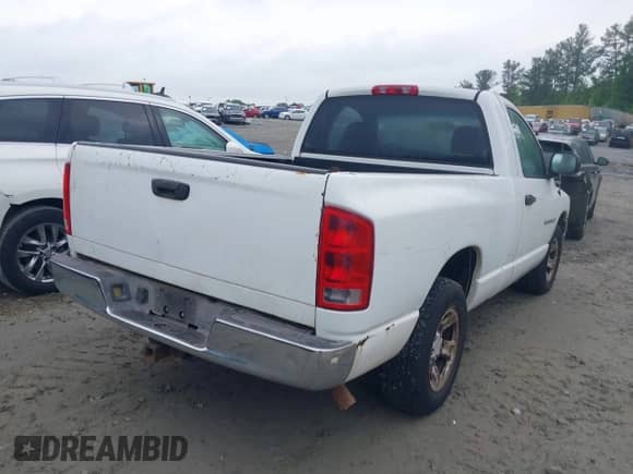 2002 Dodge 1500 z VIN 1D7HA16NX2J158843, wystawiony jako IAAI lot #42118551 z przebiegiem 181 983 mil mil oraz . Historia ofert i sprzedaży dostępna na DreamBid. Obrazek 4.