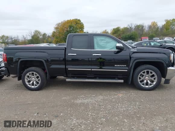 2017 GMC Sierra 1500 SLT with VIN 1GTV2NEC2HZ370535, listed as a IAAI auction lot 43370580 with 58,224 mi miles and . Bid and sale history available at DreamBid. Image 13.