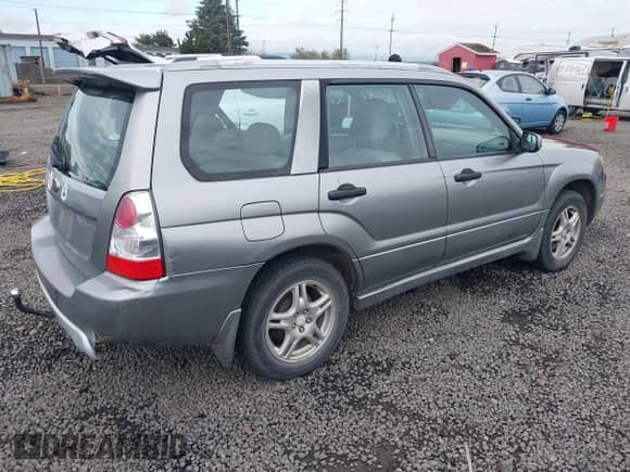 2007 Subaru Forester X with VIN JF1SG63607G735172, listed as a IAAI auction lot 43408724 with 189,094 mi miles and . Bid and sale history available at DreamBid. Image 4.