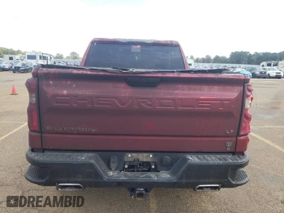 2021 Chevrolet Silverado 1500 LT Trail Boss with VIN 1GCPYFEL2MZ386824, listed as a Copart auction lot 76760034 with 70,008 mi miles and Salvage title. Bid and sale history available at DreamBid. Image 6.