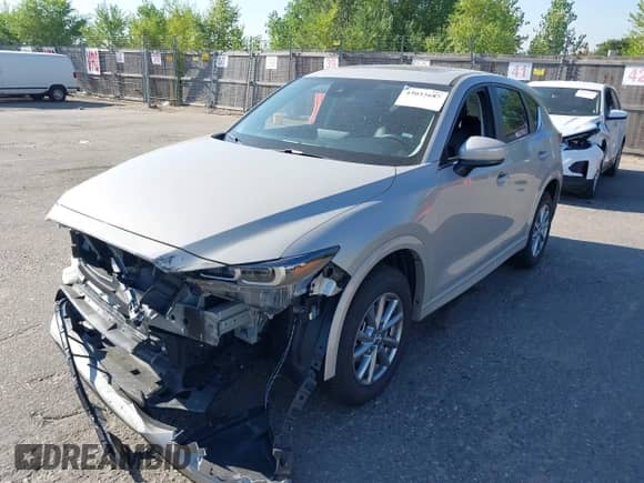 2025 Mazda CX-5 S Preferred z VIN JM3KFBCL1S0678646, wystawiony jako IAAI lot #43033687 z przebiegiem 3 690 mil mil oraz . Historia ofert i sprzedaży dostępna na DreamBid. Obrazek 18.