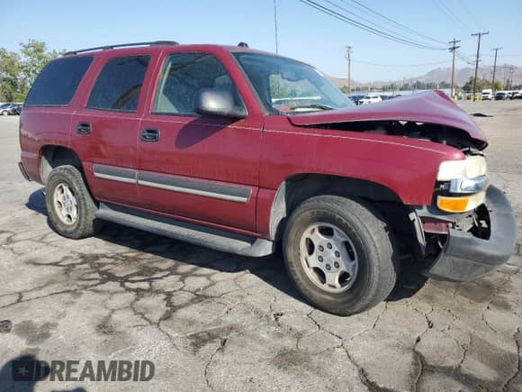 2004 Chevrolet Tahoe LS with VIN 1GNEC13T44R294049, listed as a Copart auction lot 59900565 with 149,379 mi miles and Salvage title. Bid and sale history available at DreamBid. Image 4.