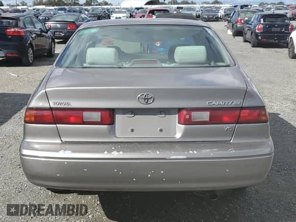 1997 Toyota Camry LE с VIN 4T1BF22K8VU037634, выставлен на аукционе Copart как лот 81998345 с пробегом 169 624 миль миль и Списание • Salvage title. История ставок и продаж доступна на DreamBid. Изображение 6.