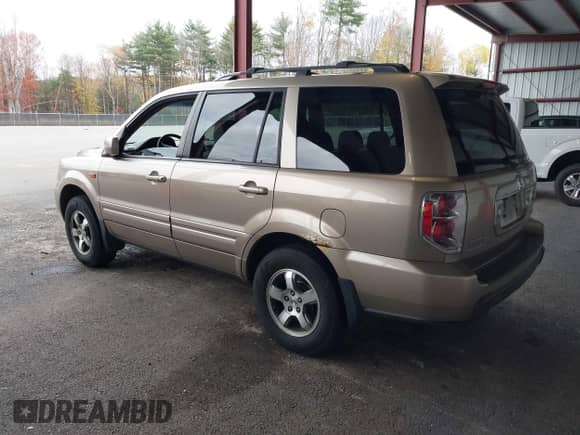 2006 Honda Pilot EX-L with VIN 2HKYF18646H558848, listed as a IAAI auction lot 43510225 with 225,289 mi miles and . Bid and sale history available at DreamBid. Image 3.