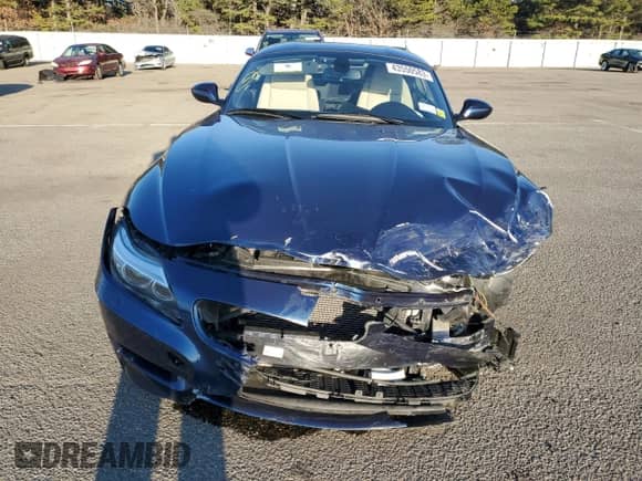 2014 BMW Z4 sDrive35i with VIN WBALM7C57EE386196, listed as a Copart auction lot 61398974 with 60,204 mi miles and Non repairable. Bid and sale history available at DreamBid. Image 5.