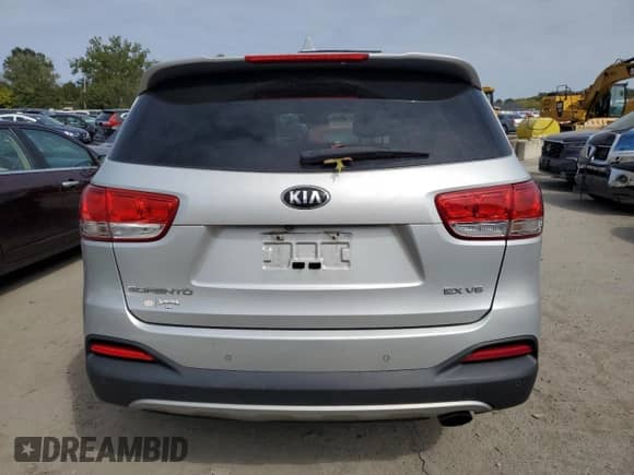 2016 Kia Sorento EX z VIN 5XYPHDA55GG008916, wystawiony jako Copart lot #81569785 z przebiegiem Nie podano mil oraz Szkoda całkowita • Salvage title. Historia ofert i sprzedaży dostępna na DreamBid. Obrazek 6.