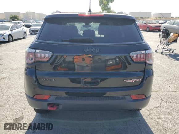 2017 Jeep Compass Trailhawk with VIN 3C4NJDDB1HT689762, listed as a Copart auction lot 60937205 with 99,282 mi miles and Salvage title. Bid and sale history available at DreamBid. Image 6.