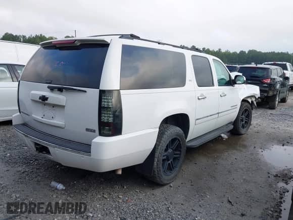 2009 Chevrolet Suburban LTZ z VIN 1GNFK36359R256609, wystawiony jako IAAI lot #42799458 z przebiegiem 146 257 mil mil oraz . Historia ofert i sprzedaży dostępna na DreamBid. Obrazek 4.