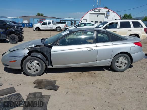 2002 Saturn SC with VIN 1G8ZY12722Z243236, listed as a IAAI auction lot 42464967 with 148,855 mi miles and . Bid and sale history available at DreamBid. Image 15.