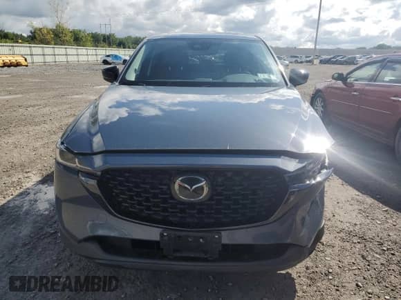 2023 Mazda CX-5 S Carbon Edition z VIN JM3KFBCM1P0249281, wystawiony jako Copart lot #70537745 z przebiegiem 22 623 mil mil oraz Szkoda całkowita • Salvage title. Historia ofert i sprzedaży dostępna na DreamBid. Obrazek 5.