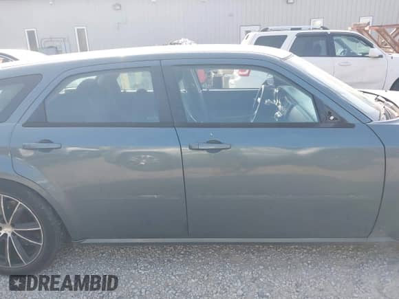 2005 Dodge Magnum SE with VIN 2D4FV48T05H531237, listed as a IAAI auction lot 42701272 with 231,885 mi miles and . Bid and sale history available at DreamBid. Image 13.
