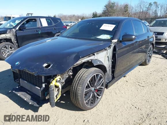 2021 BMW 5 Series 540i xDrive with VIN WBA73BJ0XMWX01449, listed as a IAAI auction lot 41630703 with 65,212 mi miles and . Bid and sale history available at DreamBid. Image 2.